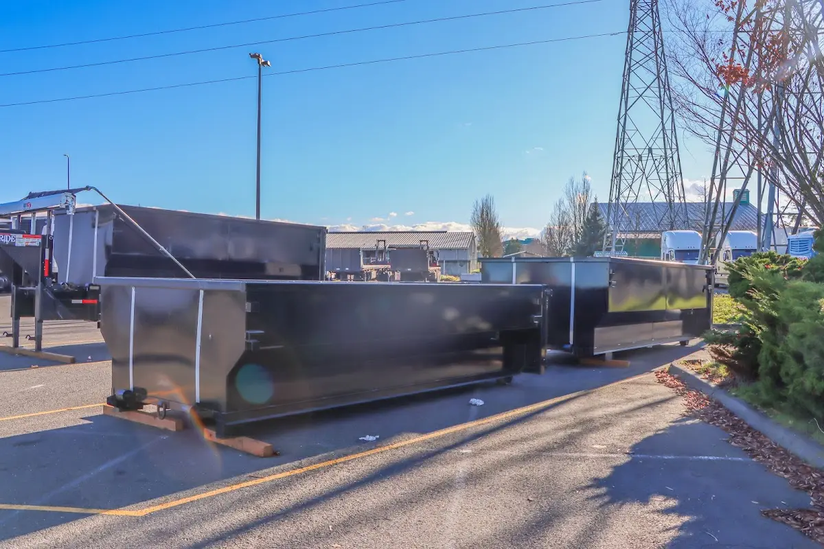 Roll-off dumpster ready for waste disposal at job site for 2 Yard Dumpster Rental in Hurricane